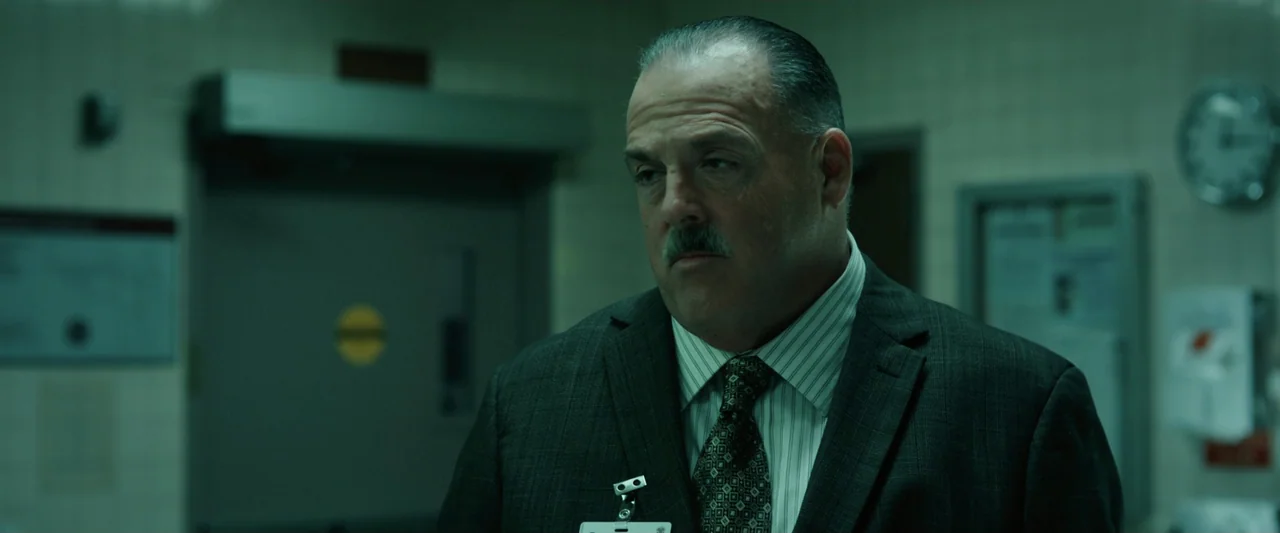 True Account: Breaking the Truce (Yakuza Bloody Chronicles 2) (2007) movie still: medium — A sterile medical hallway features tiled walls and a…