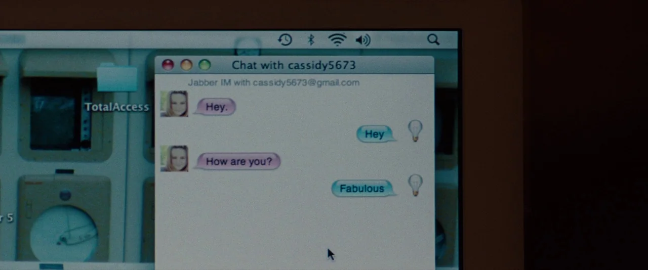 The Spectacular Now (2013) movie still: closeup — A close-up view of a computer screen showing an open instant messaging chat window. The window…