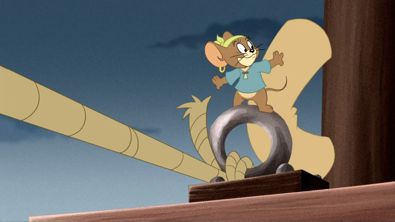 Tom and Jerry: Shiver Me Whiskers (2006) movie still: medium — A cartoon mouse character stands on the deck of a wooden sailing ship at night. The…