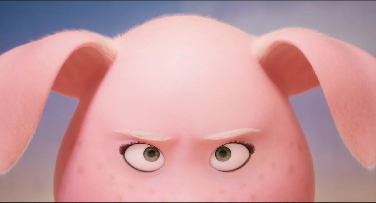 Sing (2016) movie still: closeup — A close-up of a pink anthropomorphic pig face against a blurred light sky. The subject looks directly into the…