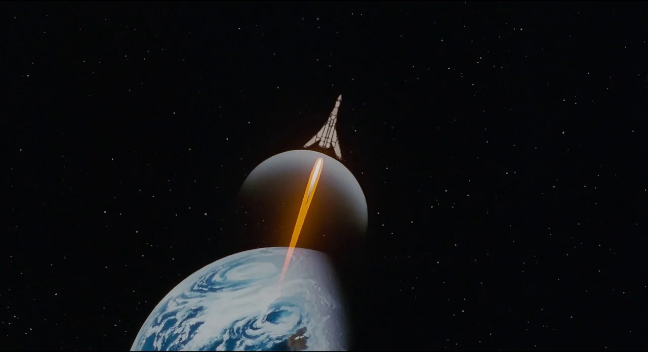 Millenium Actress (2001) movie still: wide — A dark, star-filled expanse of outer space features a planet and a departing rocket. A long, thin…