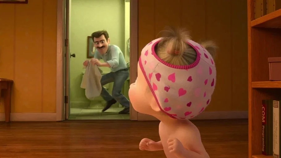 Inside Out (2015) movie still: medium — A domestic interior with yellow walls and wooden floors connecting to a tiled room. A toddler with underwear…