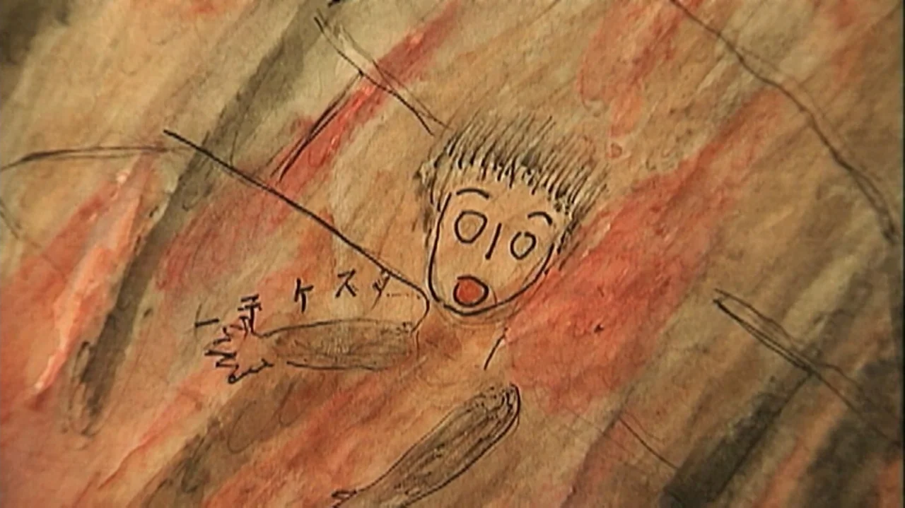 White Light/Black Rain: The Destruction of Hiroshima and Nagasaki (2007) movie still: closeup — A handmade drawing on paper features a crudely…