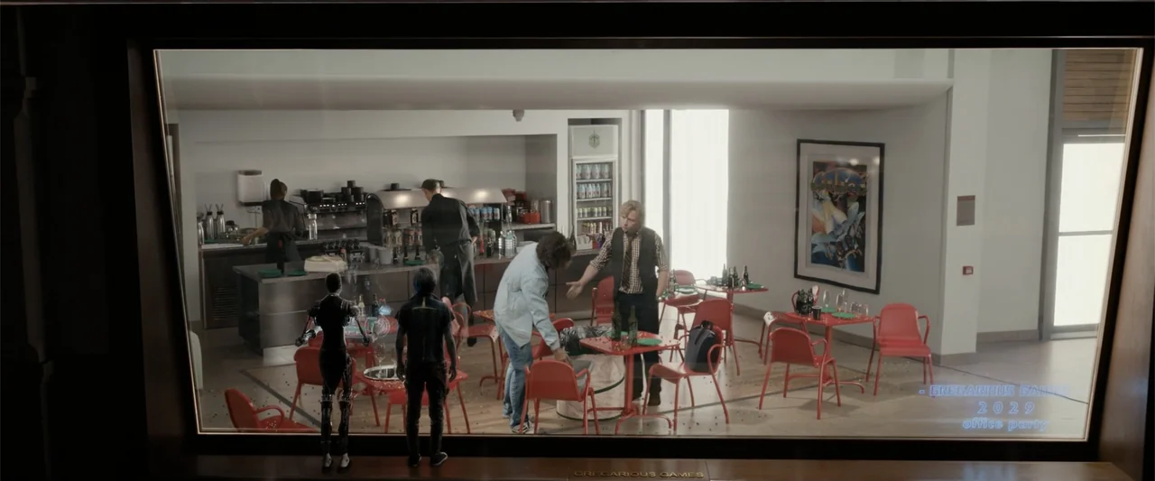 Ready Player One (2018) movie still: wide — A sterile corporate breakroom features a service counter and multiple bright red tables. Several people…