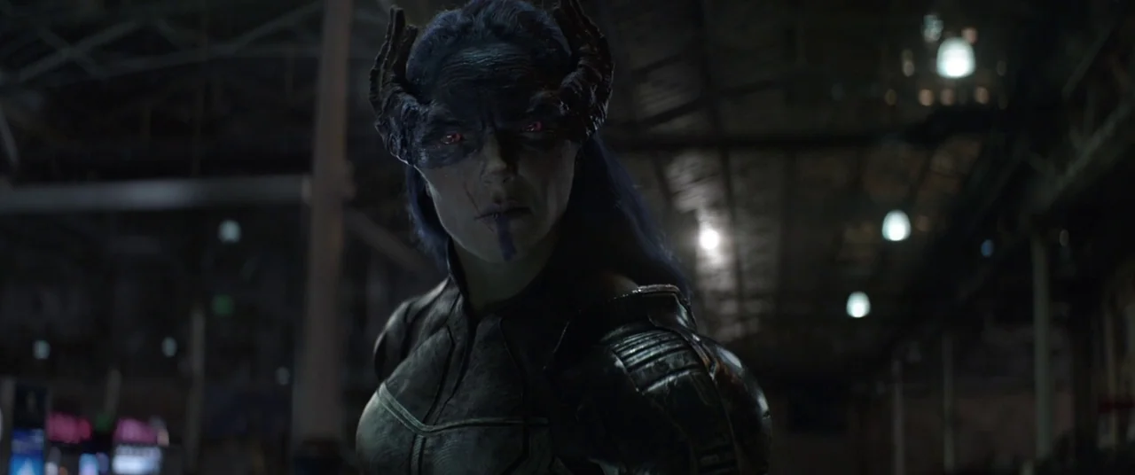 Avengers: Infinity War (2018) movie still: medium — A dark industrial hall with exposed ceiling trusses and distant, blurred artificial lighting. A…
