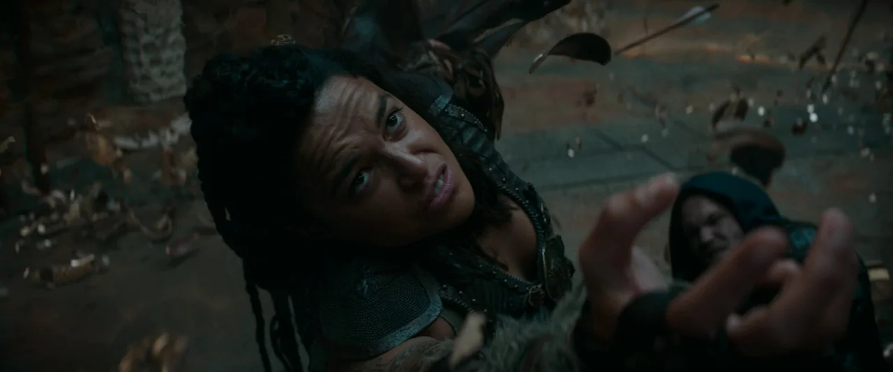 Dungeons & Dragons: Honor Among Thieves (2023) movie still: closeup — A dark battlefield filled with floating debris and shards of broken armor. A…
