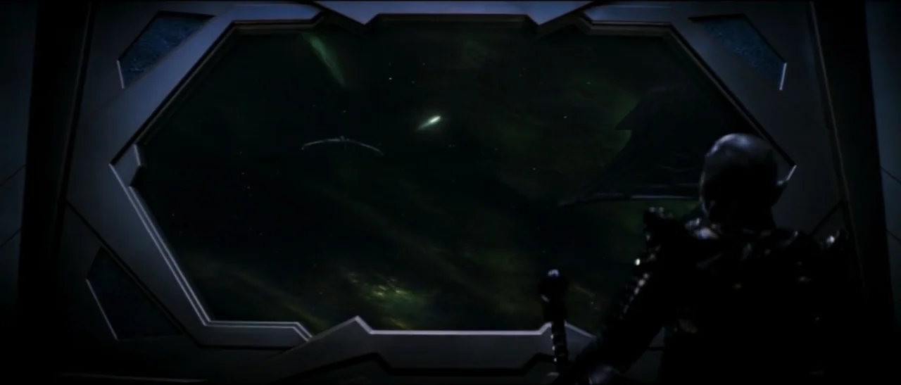 Star Trek: Nemesis (2002) movie still: medium — A dark spaceship cockpit features a massive viewport overlooking a vast, nebula-filled space. A bald…