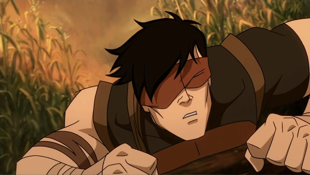 Mortal Kombat Legends: Snow Blind (2022) movie still: medium — A man with a blindfold lies prone among tall stalks of a grain field. He rests on his…
