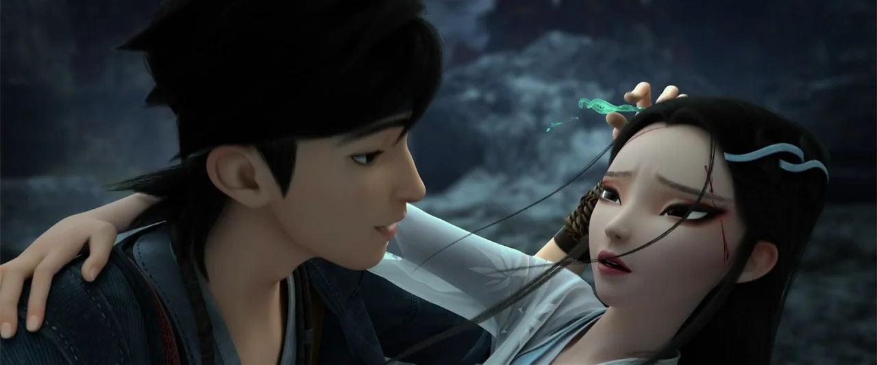 White Snake (2019) movie still: medium — A dark, jagged rocky environment serves as the background for the two characters. A young man cradles an…