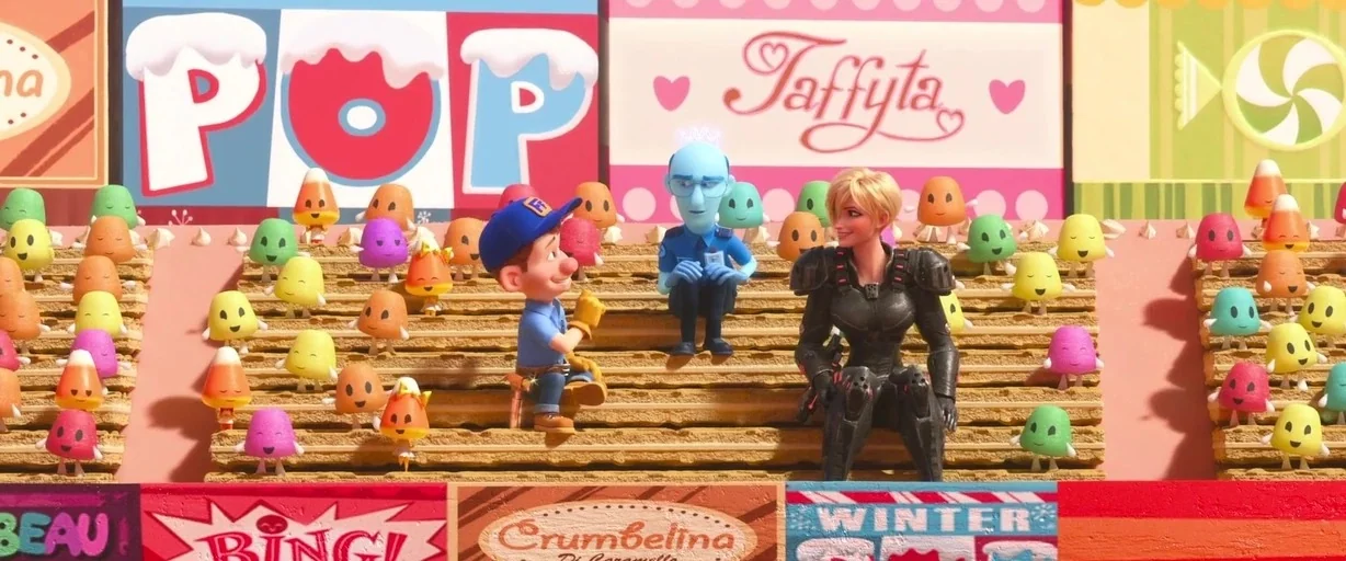 Ralph Breaks the Internet (2018) movie still: wide — A candy-themed stadium features tiered seating made of stacked wafer cookies. Three distinct…