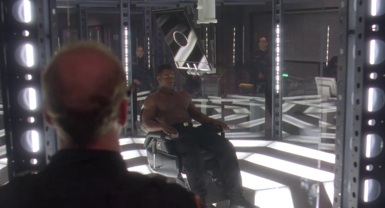 Universal Soldier: The Return (1999) movie still: medium — A high-tech laboratory features glowing floor panels and metal support pillars in a grid.…