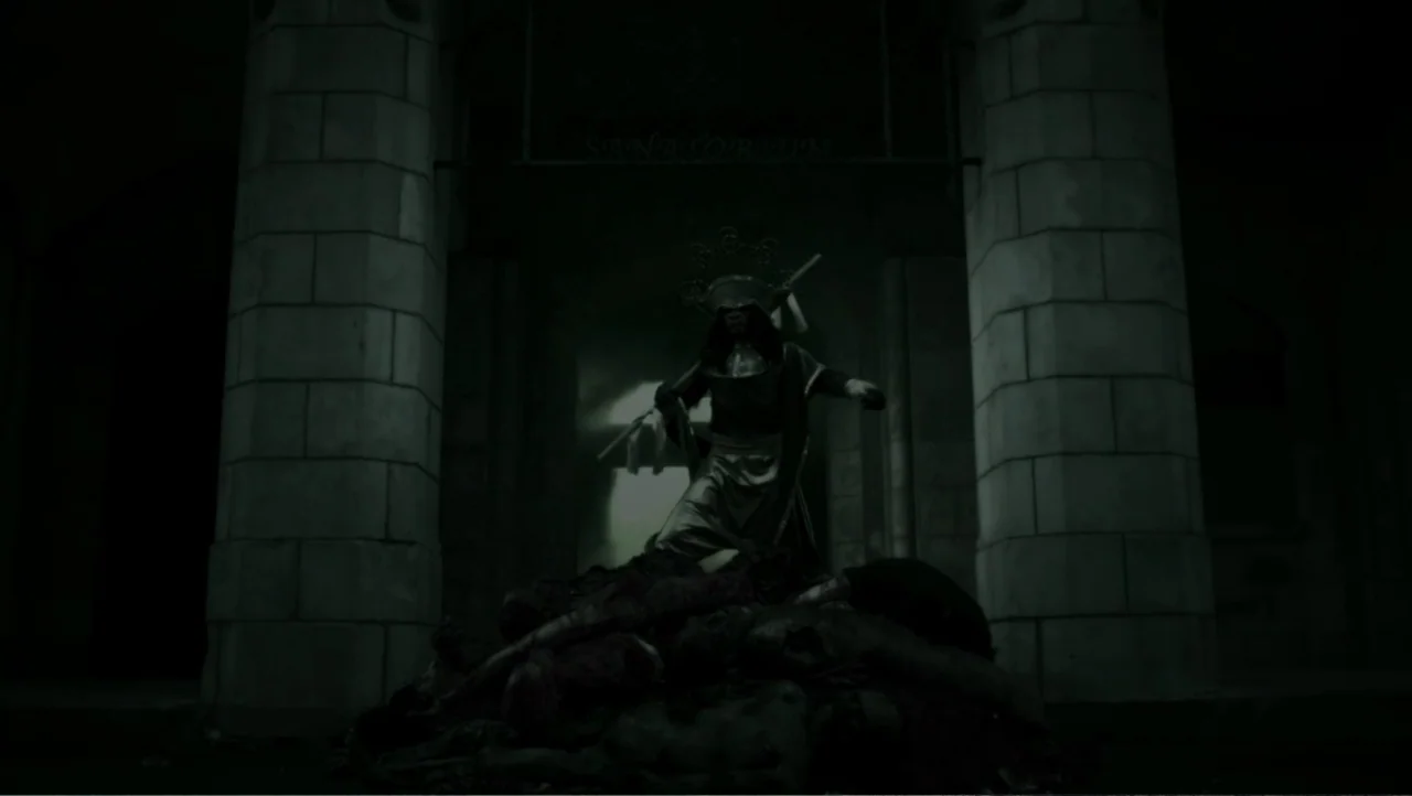 Shadow Master (2022) movie still: medium — A stone doorway is inscribed with the word sanatorium in a dark, outdoor setting. A robed figure stands…