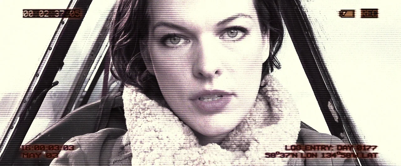 Resident Evil: Afterlife (2010) movie still: closeup — The interior of an aircraft cockpit with frame-embedded digital recording data visible. A…