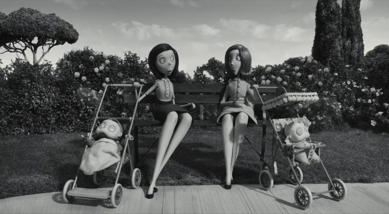 Frankenweenie (2012) movie still: fullbody — Two stylized animated women sit on a park bench during a bright sunny day. Each woman has a baby…