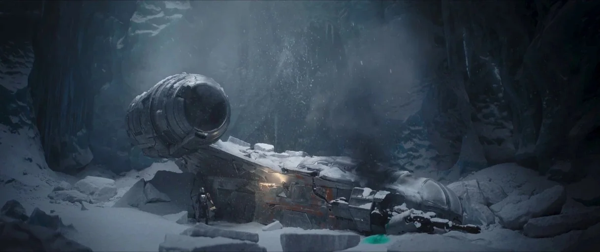 The Mandalorian (2019) movie still: wide — A dark, cavernous interior is filled with thick snow and jagged rock formations. A damaged, snow-dusted…