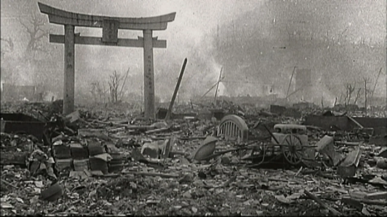 White Light/Black Rain: The Destruction of Hiroshima and Nagasaki (2007) movie still: wide — A decimated landscape features a solitary torii gate…