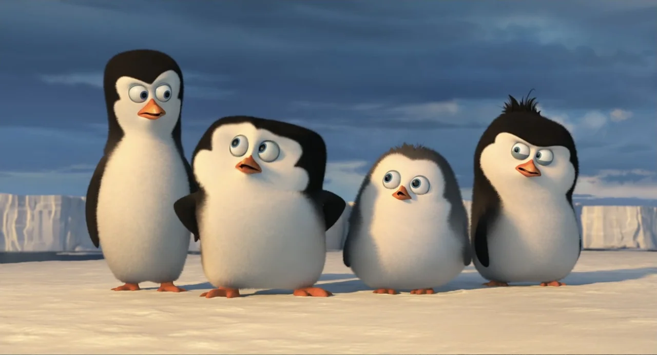 Penguins of Madagascar (2014) movie still: fullbody — Four cartoon penguins stand on a flat, white icy surface under a cloudy sky. The penguins are…