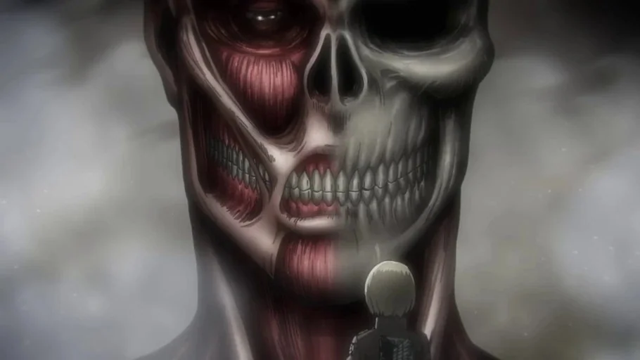 Attack on Titan (2013) movie still: medium — A gargantuan muscular head with exposed bone and muscle looms over a small soldier. The soldier stands…
