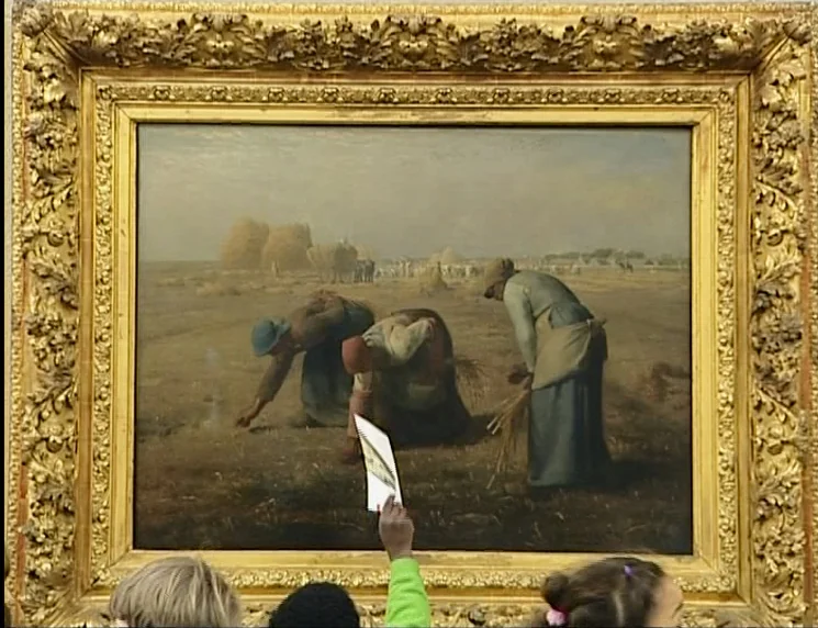 The Gleaners & I (2000) movie still: wide — An ornate gold-leaf frame surrounds an 1857 oil painting of three peasant women gleaning. A hand holds a…