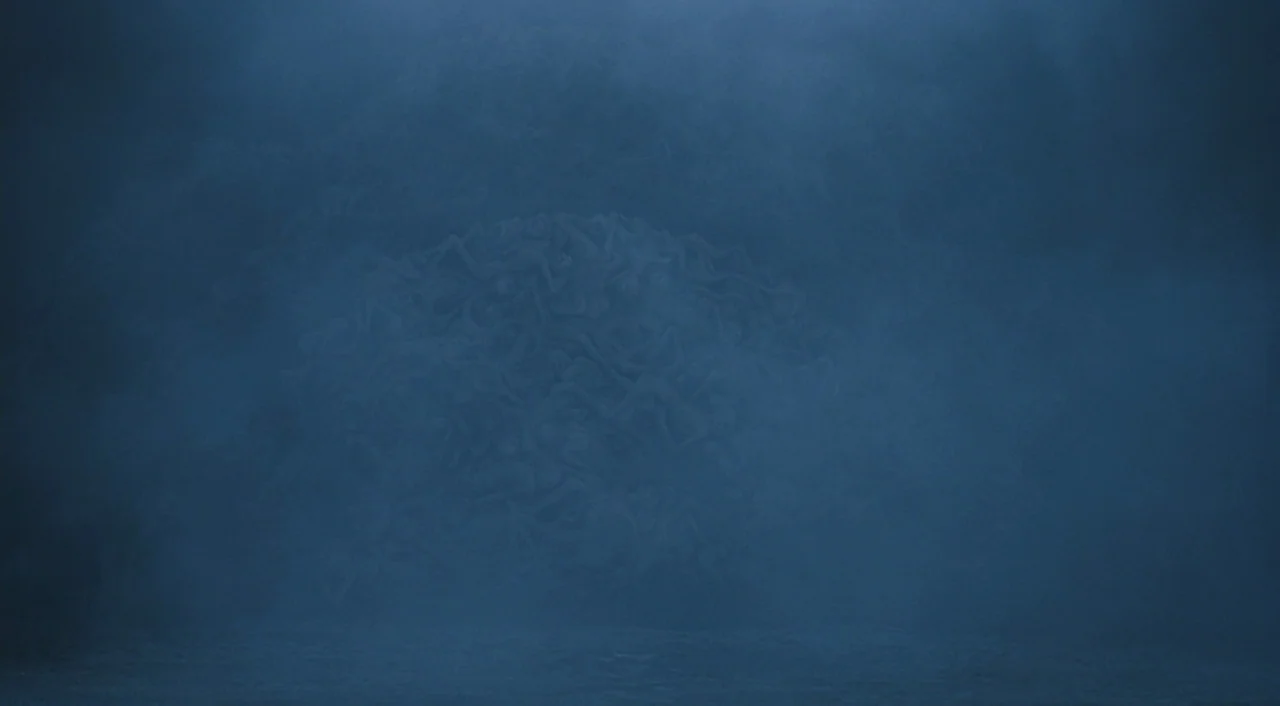 Life is Beautiful (1997) movie still: wide — A dense cluster of entangled human bodies rests within a dark, foggy, blue void. No other environmental…