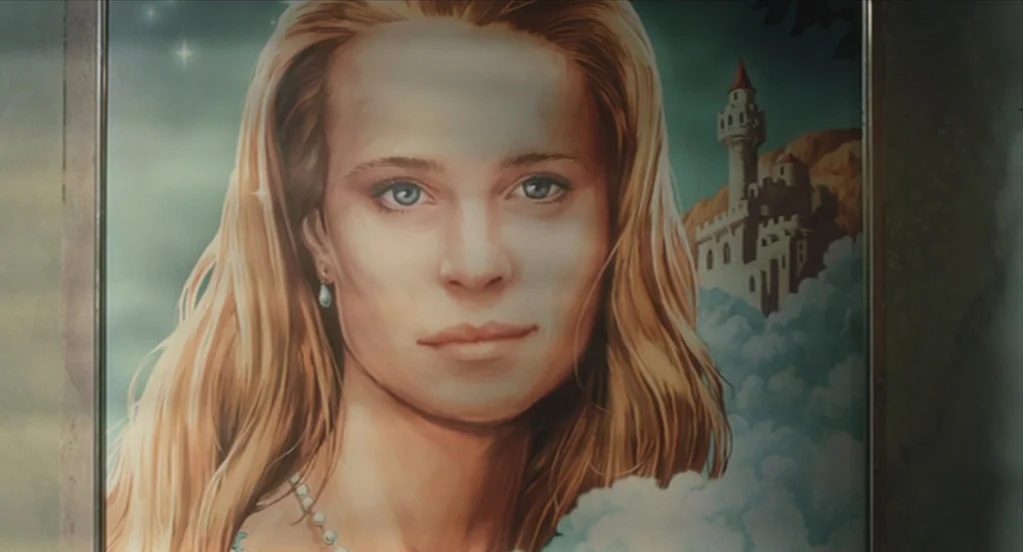 The Congress (2013) movie still: closeup — An oil painting depicts a young blonde woman against a dreamlike cloudy backdrop. A small stone castle…