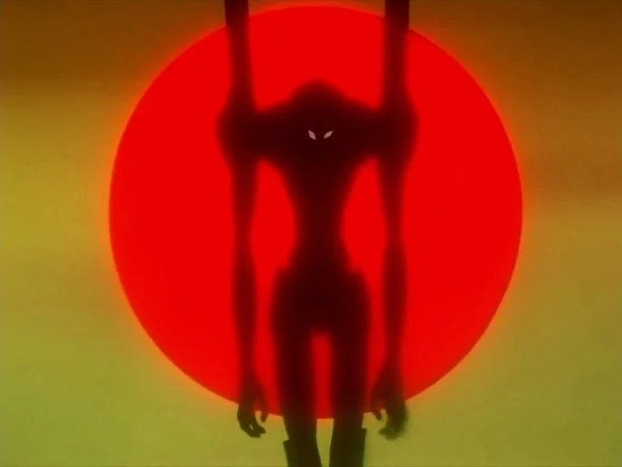 Neon Genesis Evangelion (1995) movie still: fullbody — A tall humanoid silhouette stands in front of a giant, glowing red disc. The yellow-hued sky…