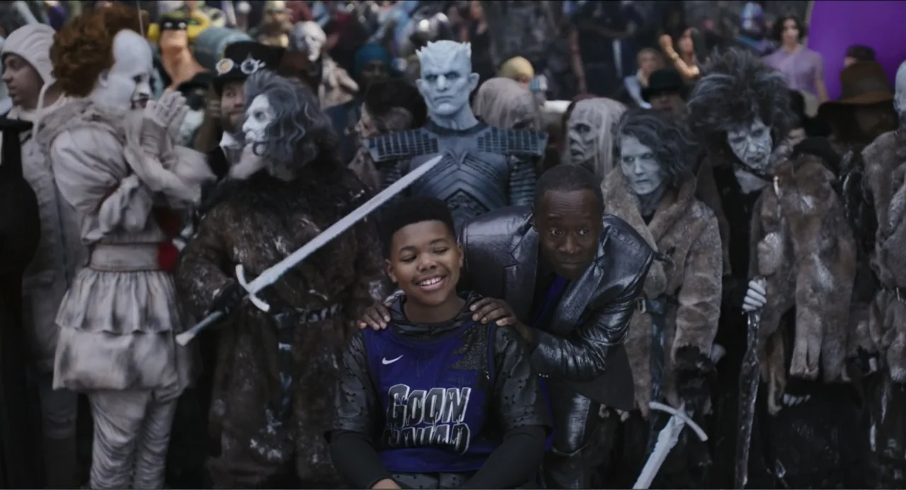 Space Jam: A New Legacy (2021) movie still: medium — A crowded film set filled with extras dressed as various fantastical movie characters. A young…