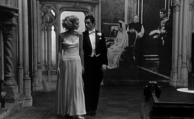 Who Are You, Polly Maggoo? (1966) movie still: fullbody — A stone-walled cathedral nave features intricate Gothic arched openings and a large…