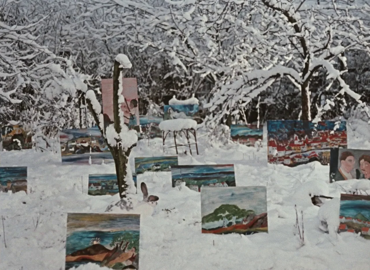 Pearls of the Deep (1965) movie still: wide — Multiple framed paintings are partially buried in a snow-covered orchard with bare trees. The artwork…