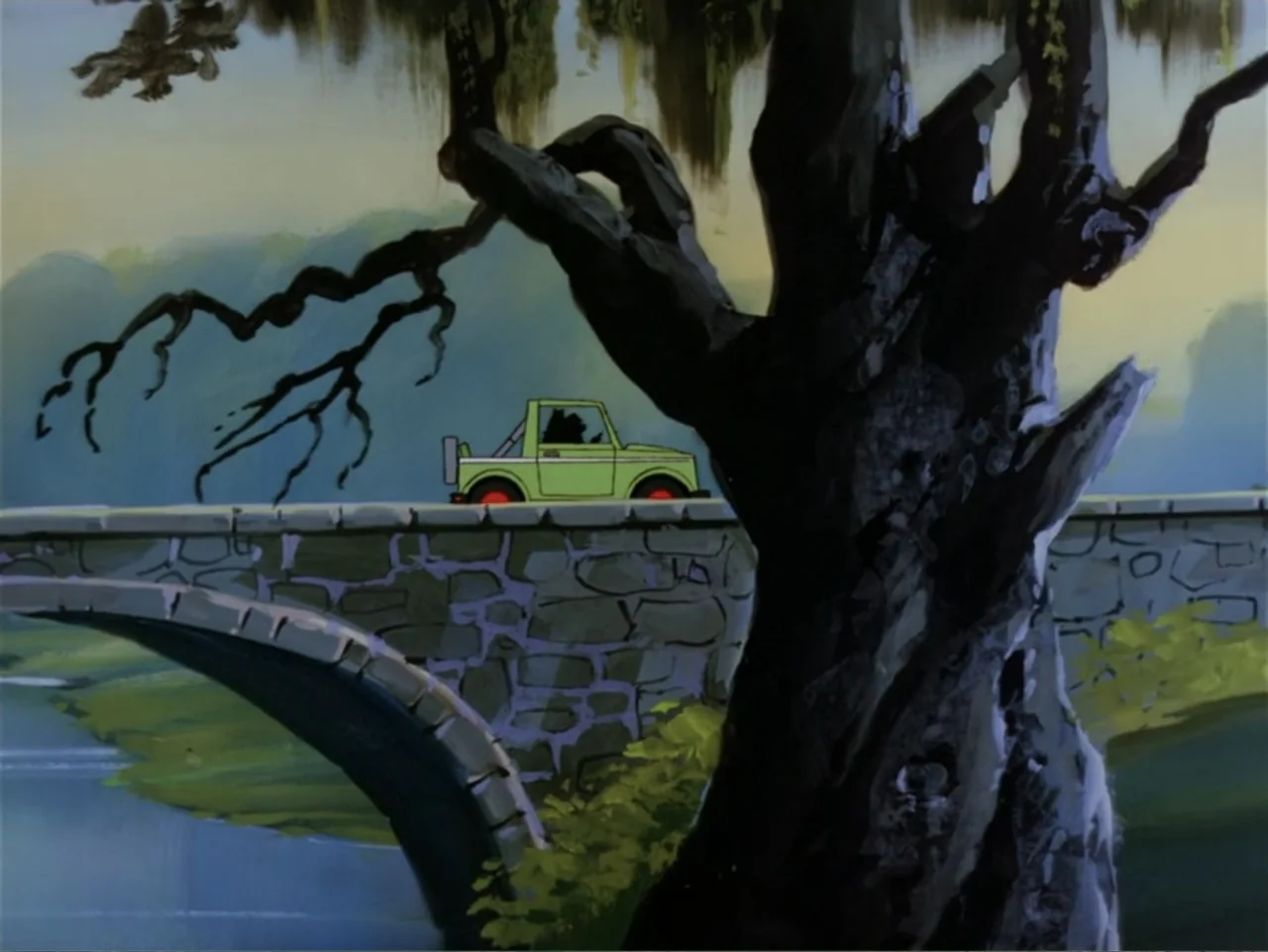 Scooby-Doo! Meets the Boo Brothers (1987) movie still: wide — A stone arch bridge spans a narrow river under a large gnarled tree. A small green…