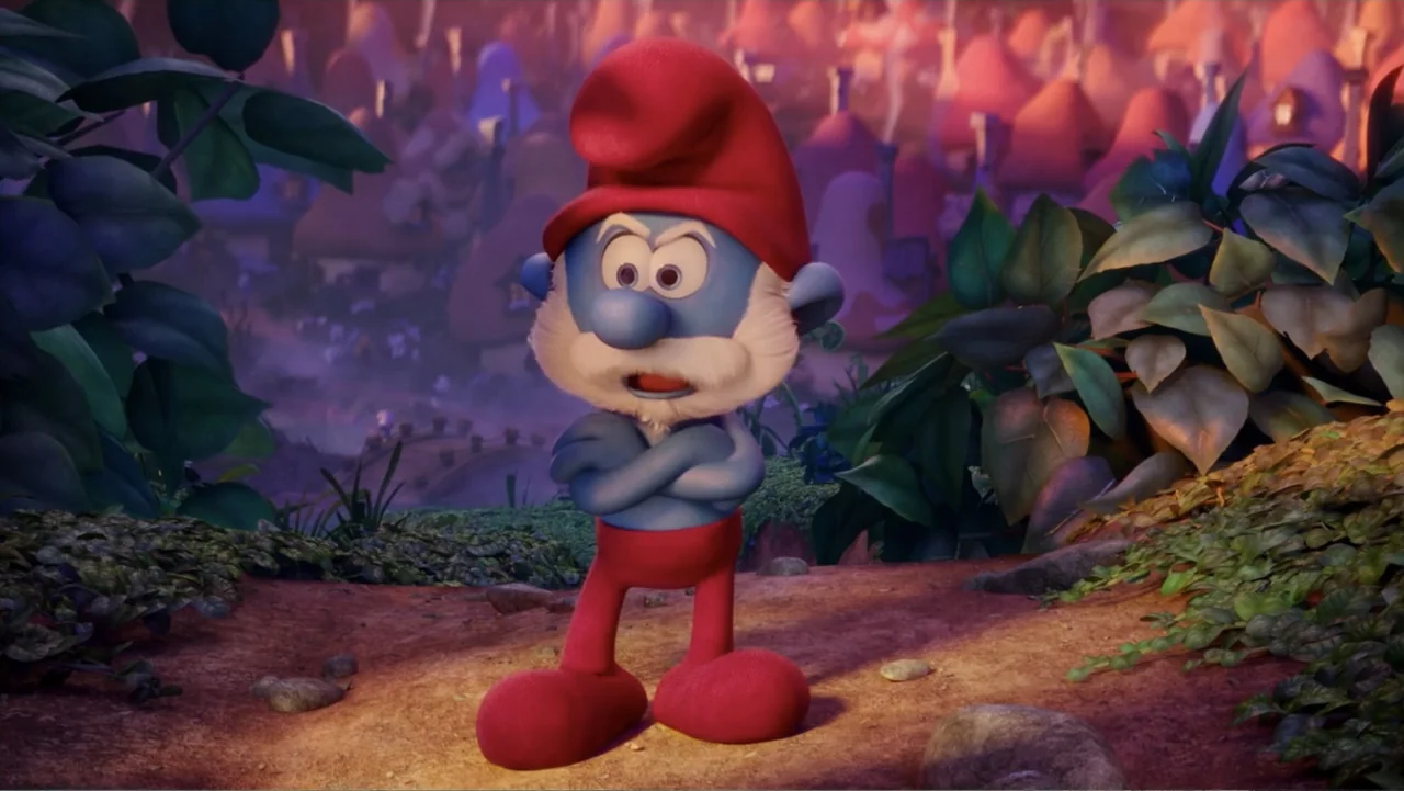 Smurfs: The Lost Village (2017) movie still: medium — A clearing in a stylized woodland with purple mushroom houses visible in the background. A…