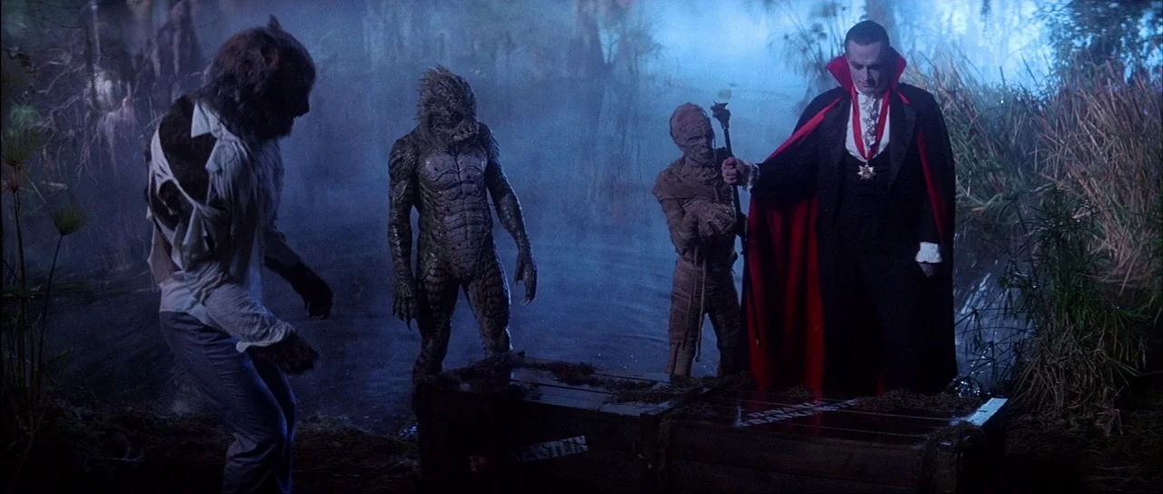 The Monster Squad (1987) movie still: wide — A foggy swamp landscape at night with thick reeds rising from the dark water. Four distinct horror…