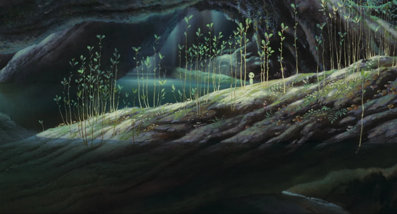 Princess Mononoke (1997) movie still: wide — A deep subterranean cavern features a subterranean pool and a moss-covered rocky embankment. Thin…