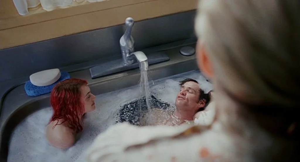 Eternal Sunshine of the Spotless Mind (2004) movie still: medium — A metal basin filled with soapy water and bubbles sits under a kitchen-style…