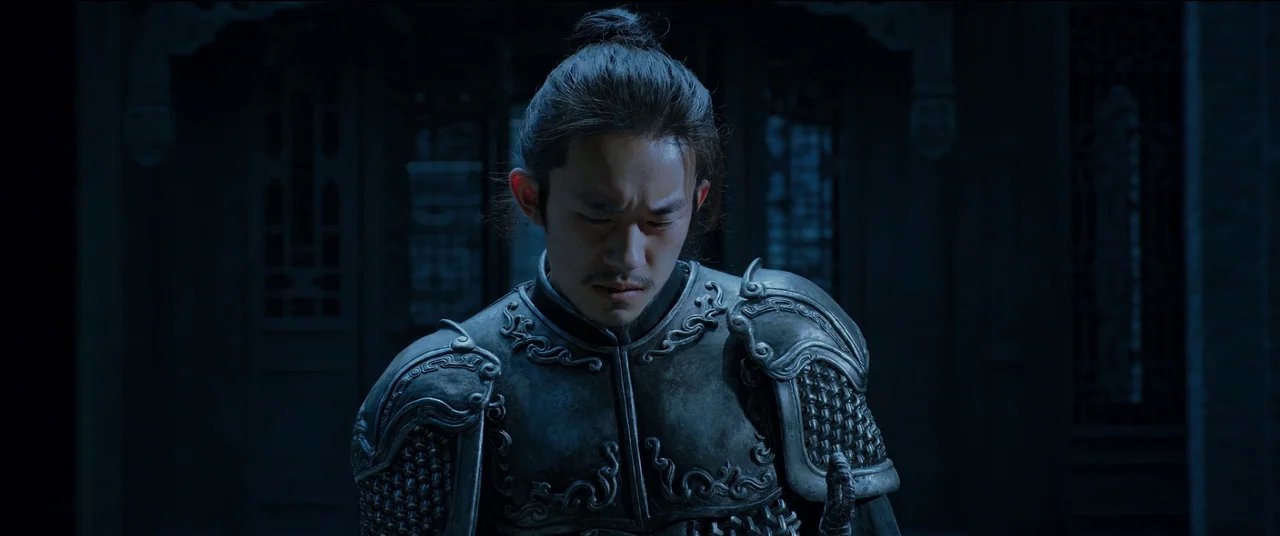 Full River Red (2023) movie still: medium — An ancient stone building at night with dark carved wooden lattice doors. A man in intricate metal armor…