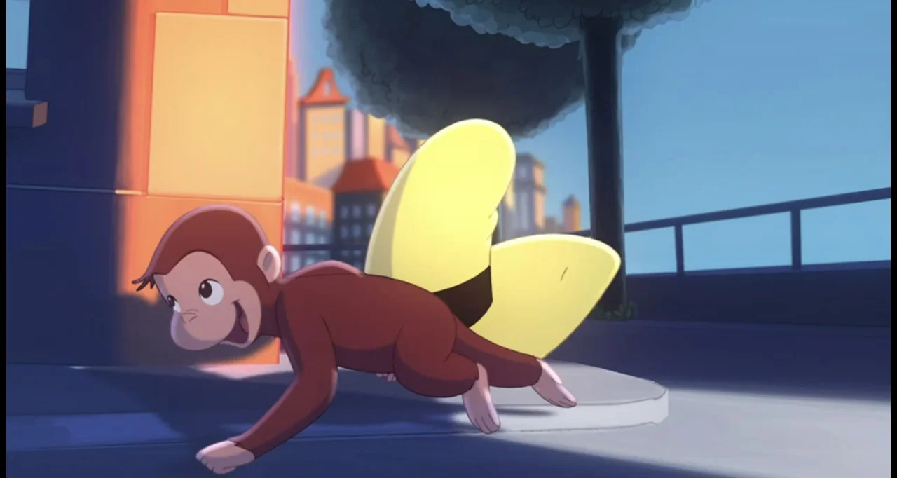 Curious George (2006) movie still: medium — An urban sidewalk during sunset with a modern city skyline in the background. A small brown monkey with…