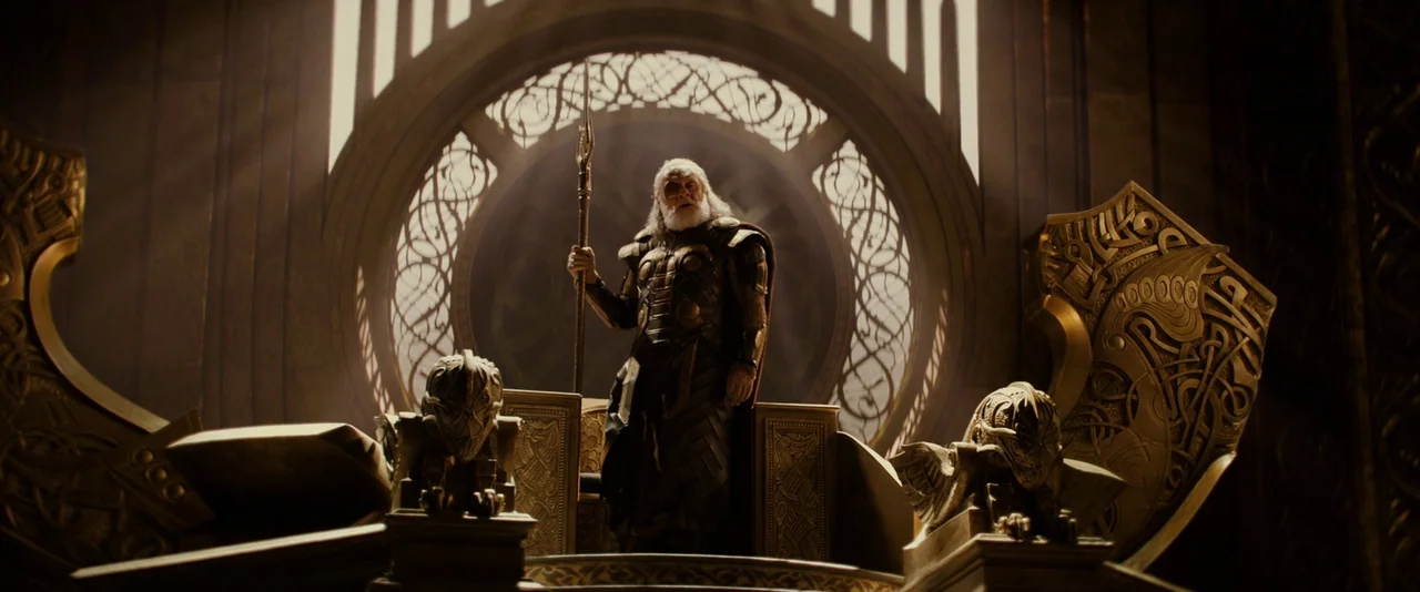 Thor: The Dark World (2013) movie still: fullbody — An opulent, cavernous stone hall features a massive circular decorative window backdrop. An…