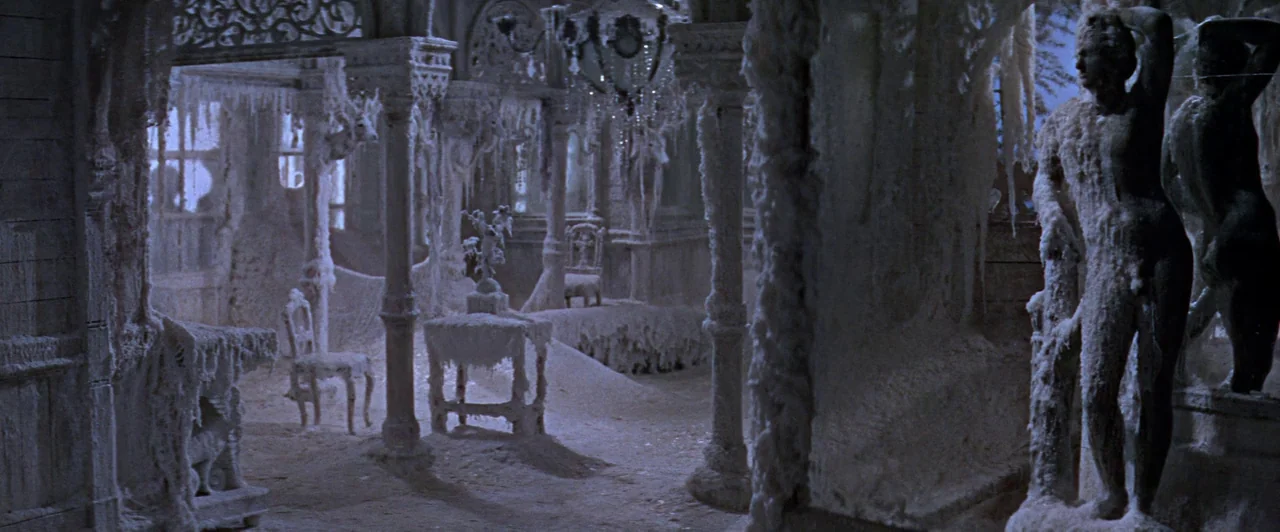 Doctor Zhivago (1965) movie still: wide — A spacious mansion room is completely covered in a thick layer of white frost. Ornate furniture and…