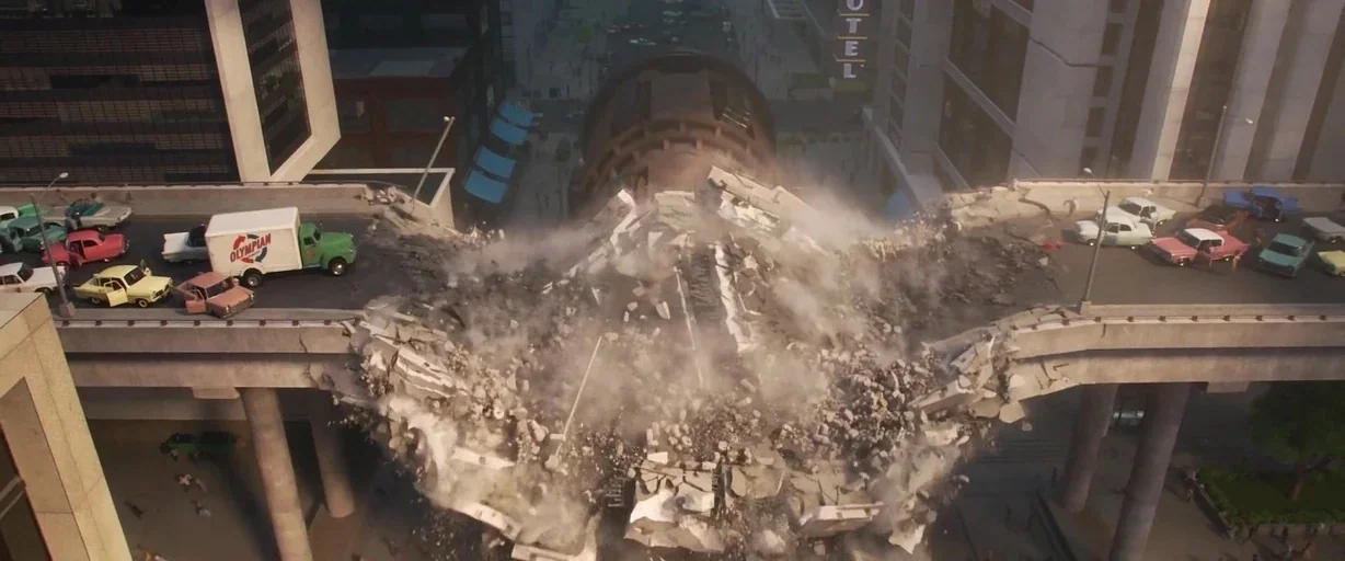 Incredibles 2 (2018) movie still: establishing — An elevated concrete highway in a 1950s urban setting suffers a massive structural failure. A…