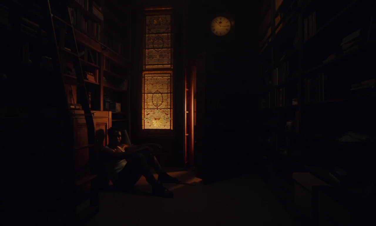 The Last Black Man in San Francisco (2019) movie still: wide — A dark, wood-paneled library features floor-to-ceiling bookshelves and a prominent…