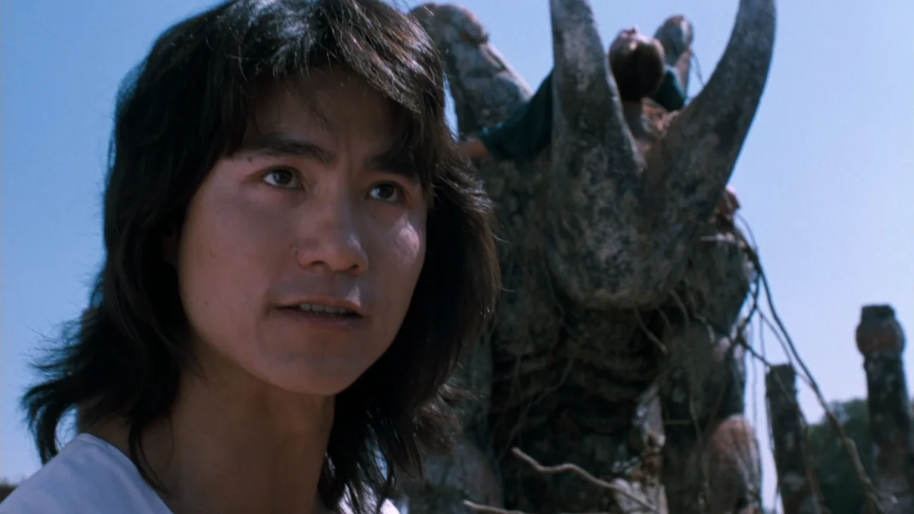 Mortal Kombat: Annihilation (1997) movie still: medium — An outdoor location features a large weathered stone sculpture in the background under…