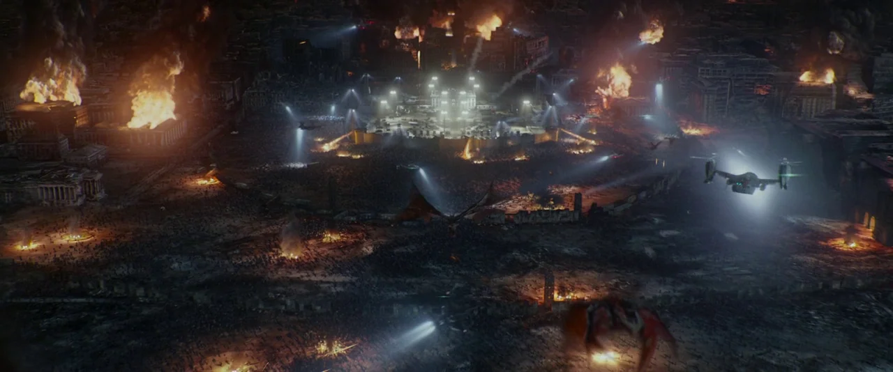 Resident Evil: Retribution (2012) movie still: establishing — A decimated, dark city landscape is engulfed in multiple massive fires and burning…