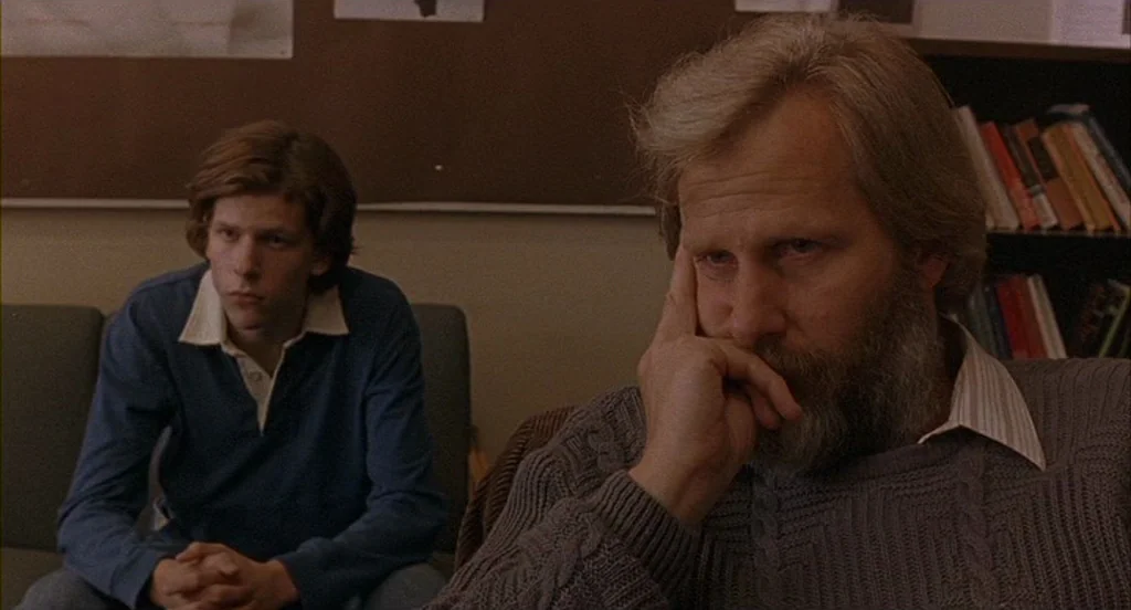 The Squid and the Whale (2005) movie still: medium — An interior waiting room features chairs against a wall with a cork bulletin board. An older…