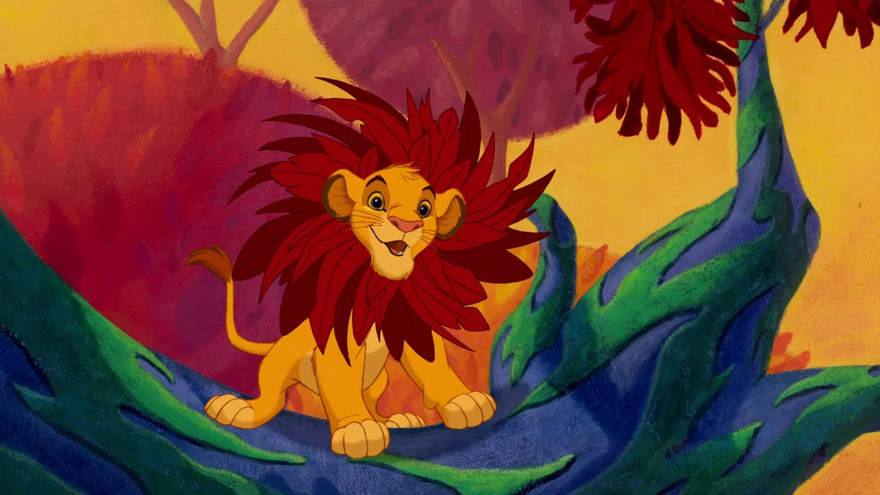 The Lion King (1994) movie still: fullbody — A surreal savanna landscape features stylized blue branches and colorful leaf-like foliage. A young…