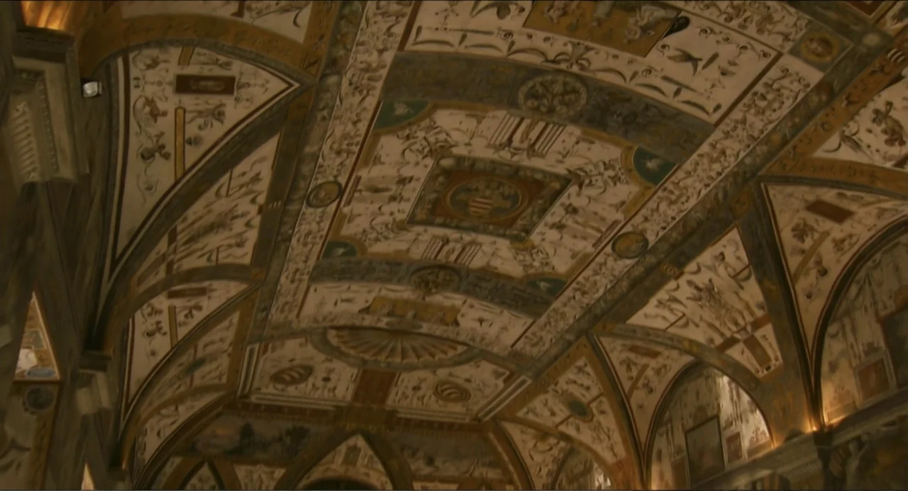 Pope Francis: A Man of His Word (2018) movie still: establishing — An ornate vaulted ceiling is covered in intricate fresco paintings and…