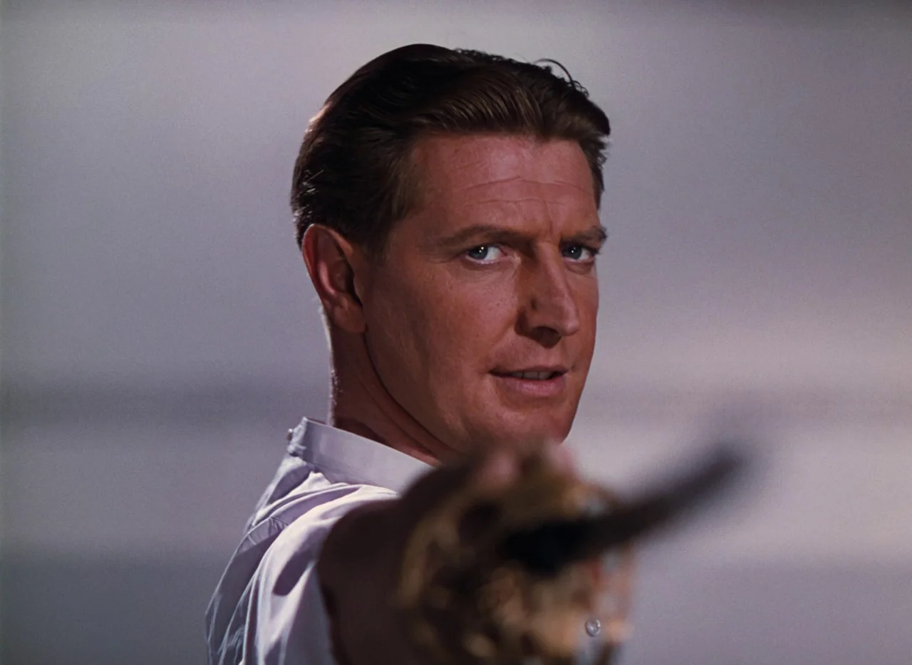 The Life and Death of Colonel Blimp (1943) movie still: closeup — An indoor space features a subject framed against a plain, light-colored…