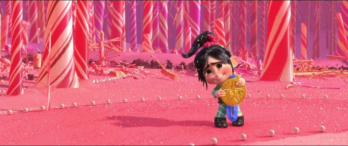 Wreck-It Ralph (2012) movie still: fullbody — A surreal landscape constructed entirely of candy with towering red and white striped poles. A young…