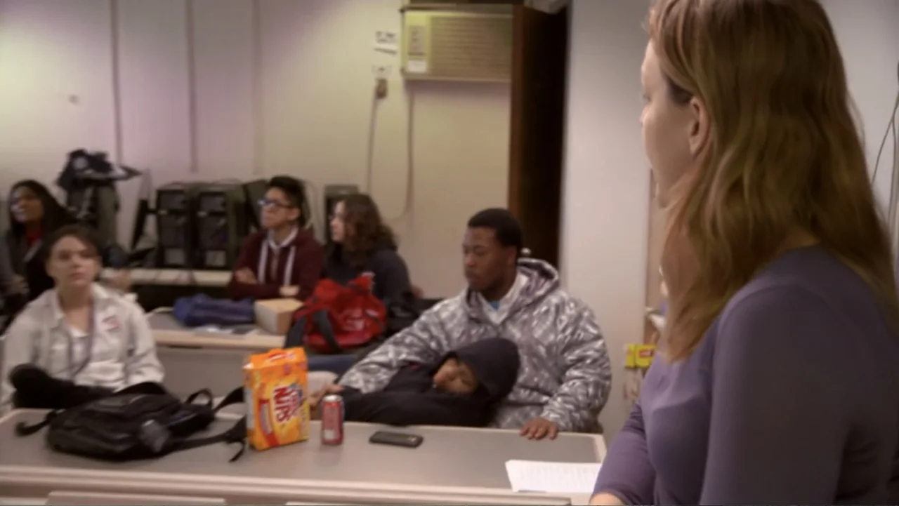 Homegrown: The Counter-Terror Dilemma (2016) movie still: medium — A modern classroom contains several students sitting at rows of desks with…