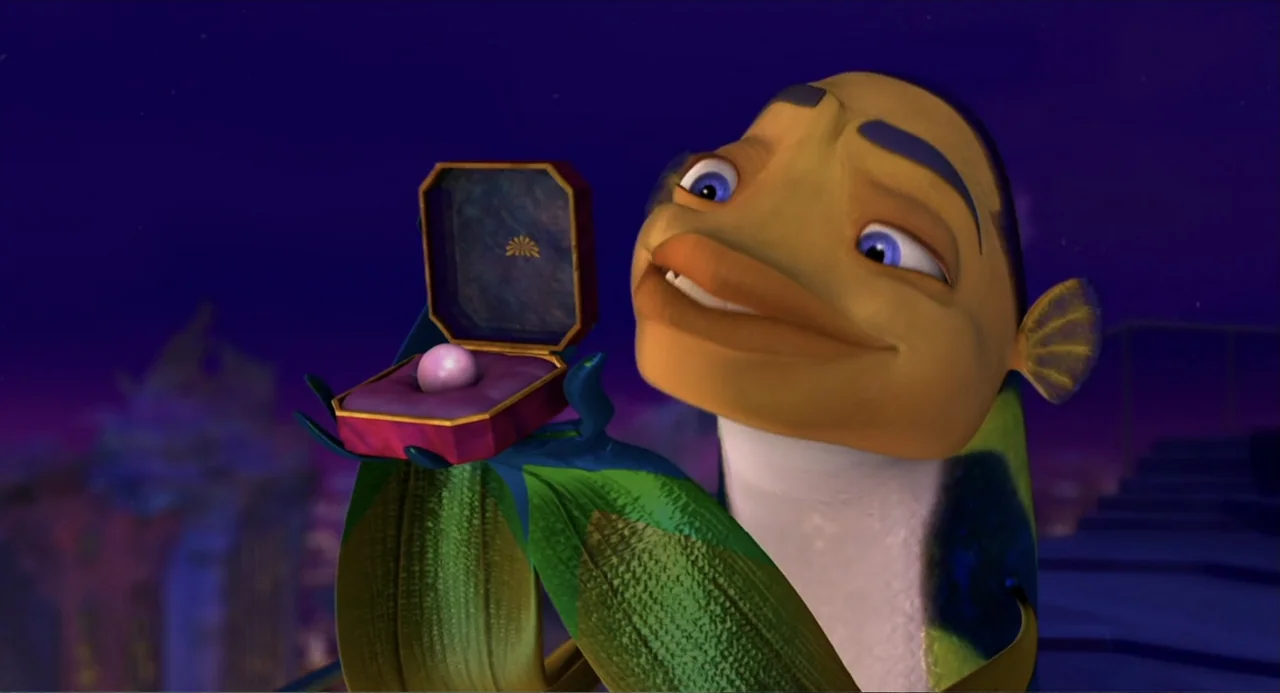 Shark Tale (2004) movie still: medium — A night setting atop a cityscape features a brightly lit anthropomorphic fish character. The character holds…