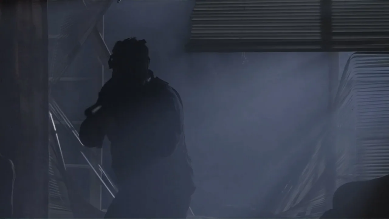 Crisis Point (2012) movie still: medium — A dimly lit room with light filtering through damaged window blinds creating visible dust trails. A…